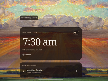 Wake screen in landscape showing Sunset by König as the background image and Moonlight Sonata by Ludwig van Beethoven as the wake sound.